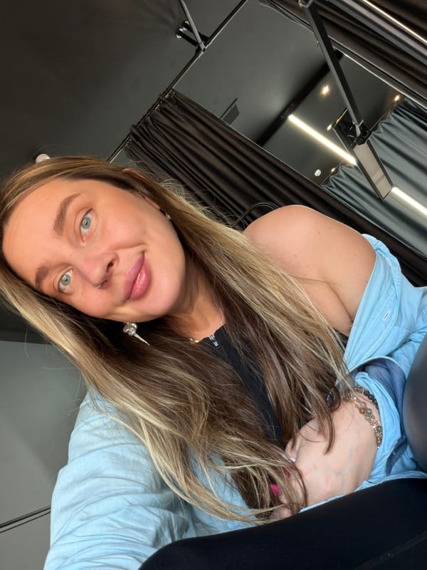 Woman spotted in Moscow dressing room wearing blue shirt