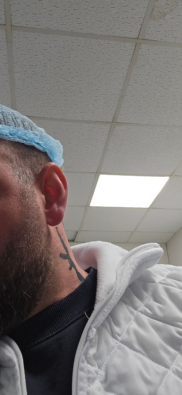 Medical worker photographed in surgical attire in Delbrück