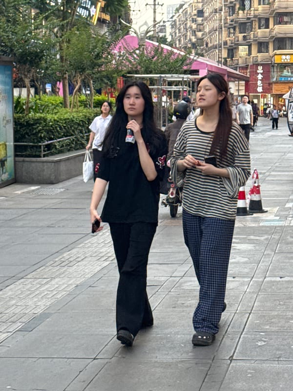 Daily street life documented across Jiangjin, China commercial districts