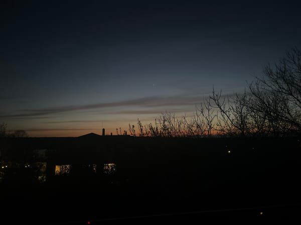 Twilight documented in Oreshak, Bulgaria with illuminated buildings