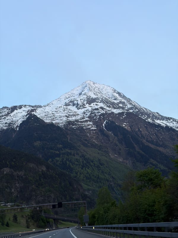 Snow-capped mountain photographed under clear skies in Amsteg, Switzerland