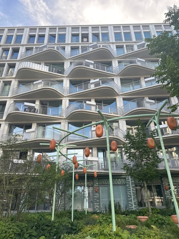 Amsterdam's wave-balcony apartment complex on a sunny afternoon