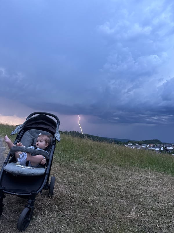 Storm rolls into Oberquembach during an evening walk on the hills