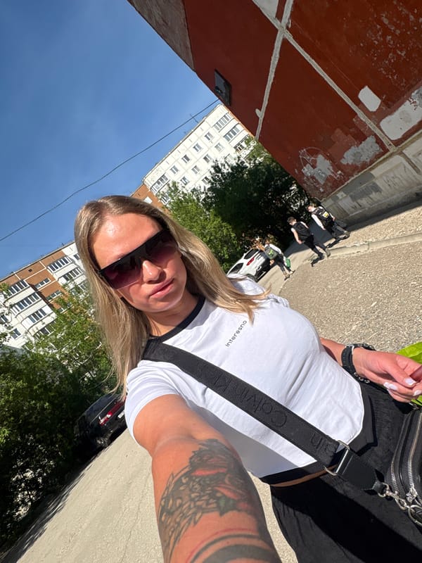 Woman takes selfie on sunny morning in Perm