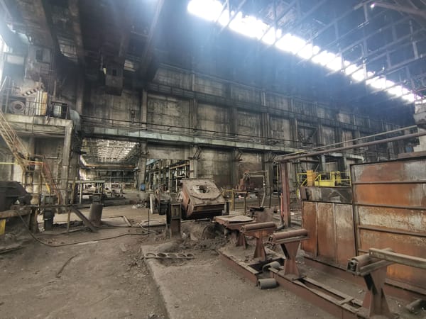 Abandoned Bulgarian factory interior documented in seven-image sequence