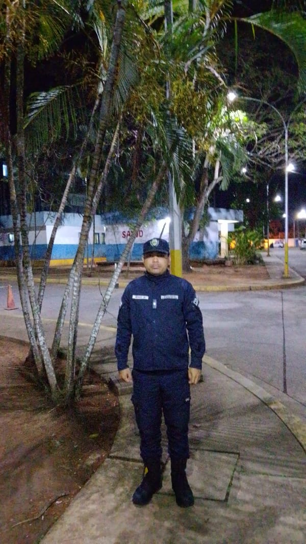 Uniformed security officer spotted during nighttime patrol in Tinaquillo