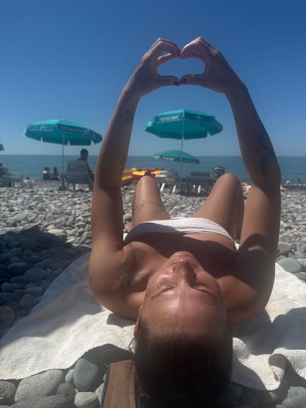 Sunny beach day on Batumi's pebble shore