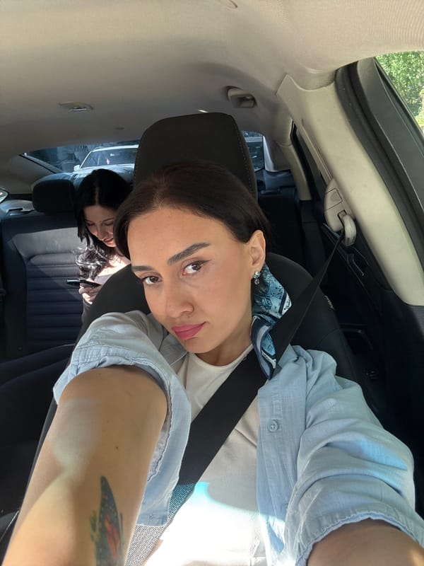 Car selfie and mirror reflection captured in Tbilisi