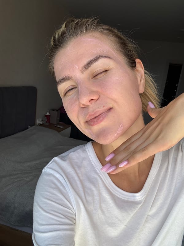 Indoor skincare session featuring a pink clay face mask