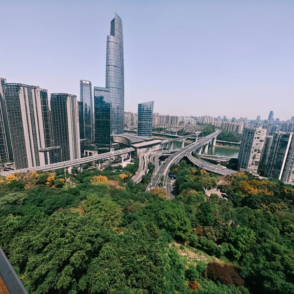 Daytime aerial views document Yuzhong District's urban landscape