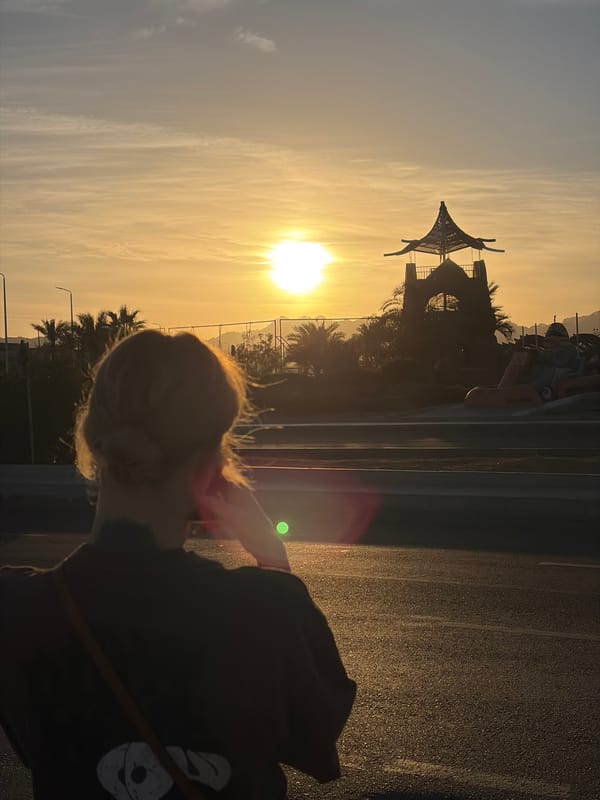 Tourists capture sunset moments in Sharm El Sheikh desert