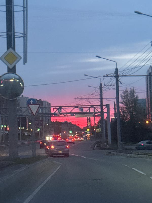 Pink sky captured over Krasnoyarsk street scene