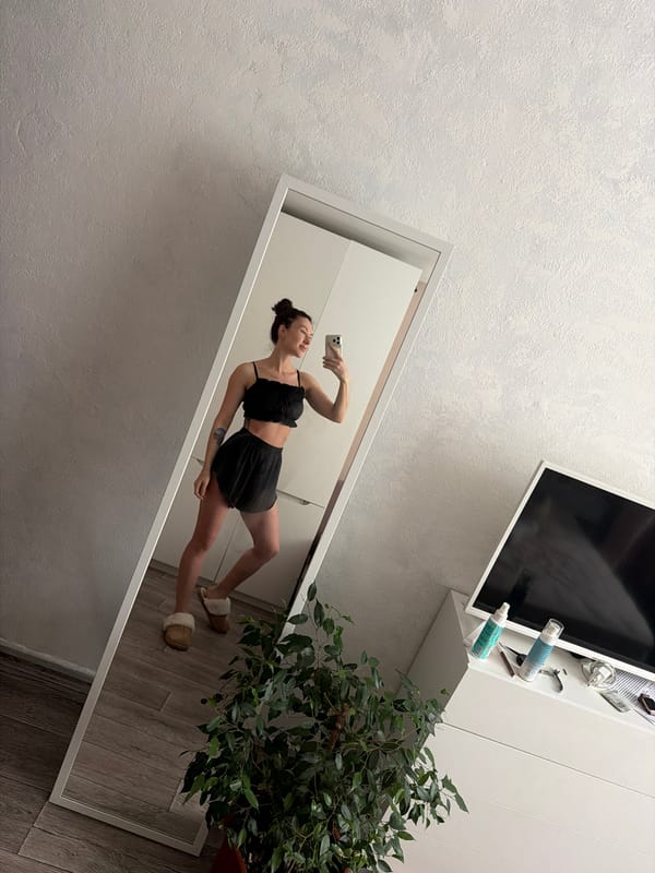 Woman takes morning mirror selfies in Perm, Russia