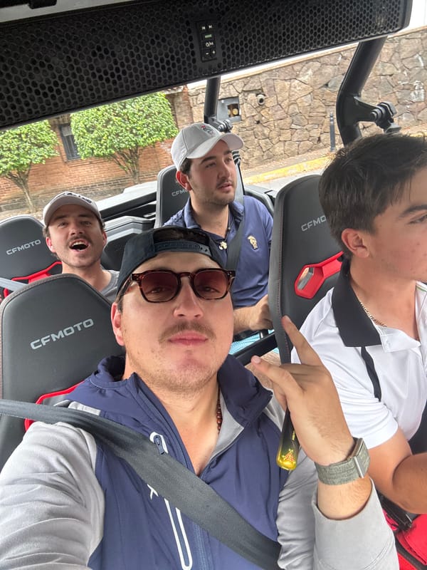 Three men travel by vehicle in Avandaro, Mexico