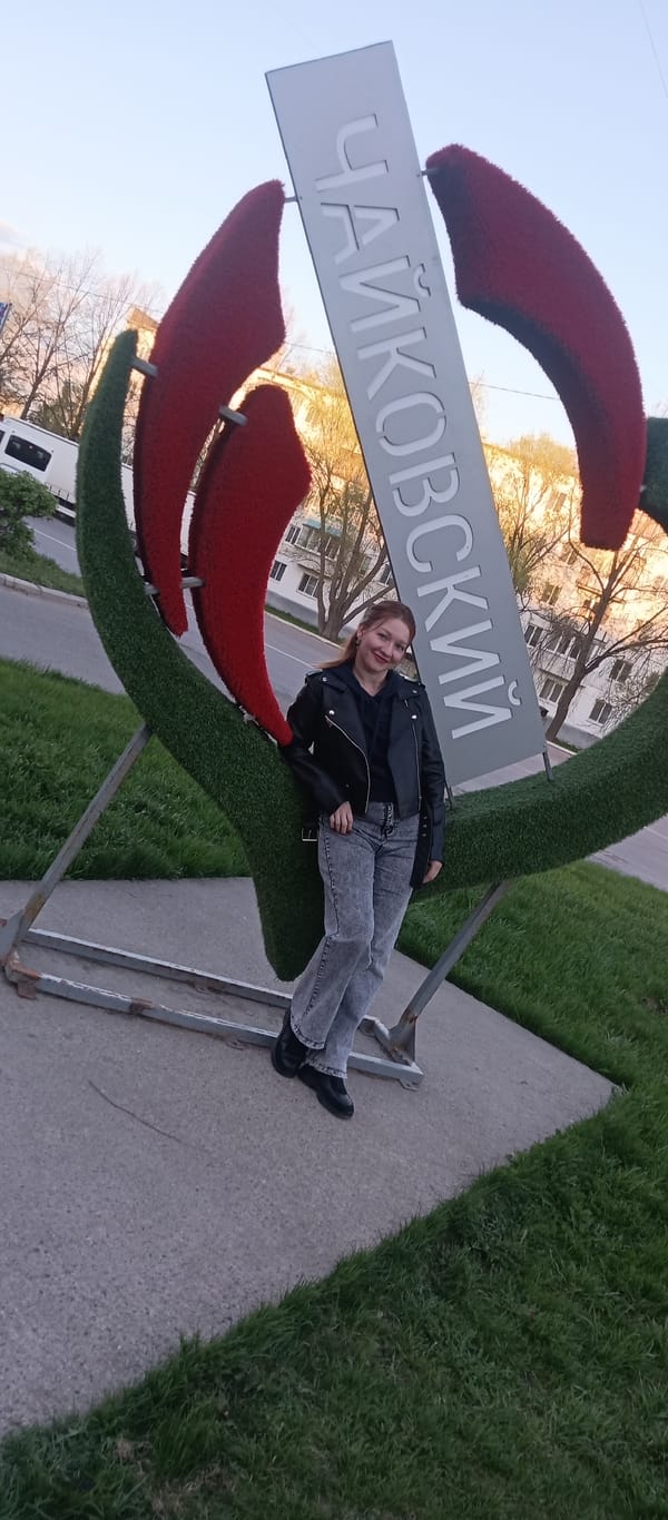 Tourists photograph themselves at Tchaikovsky city landmarks