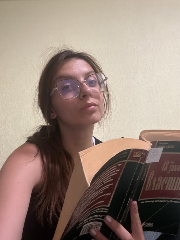 Reading, relaxing, and energy drinks on a Tryavna couch