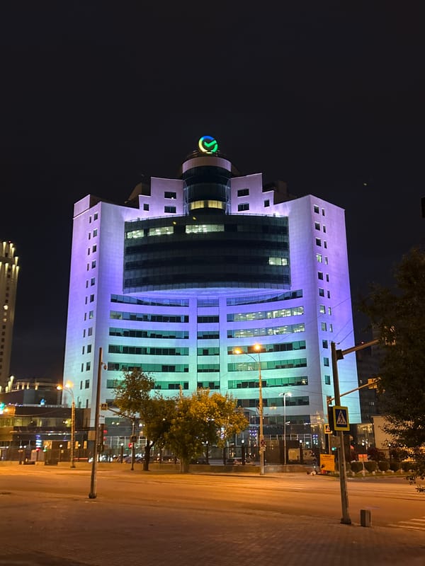 Nighttime illumination captures modern and historic Yekaterinburg architecture