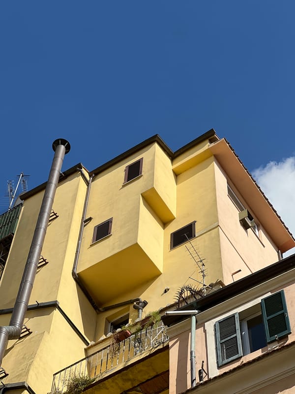 Tourist documents afternoon stroll through historic Rome neighborhoods