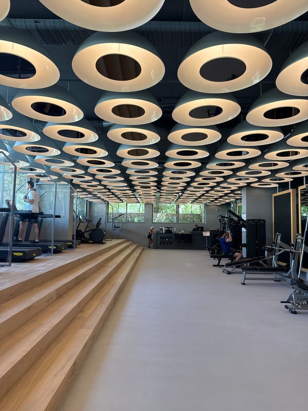 Inside a stylish Bodrum gym with standout circular ceiling lights