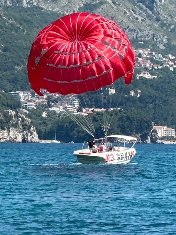 Summer beach activities documented along Montenegro coast near Rafailovići