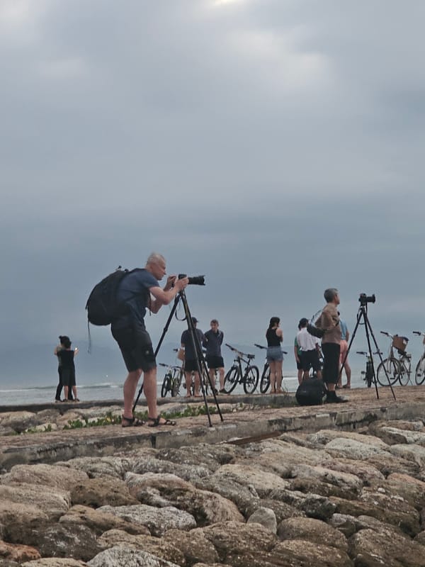 Evening waterfront gathering observed in Denpasar coastal area