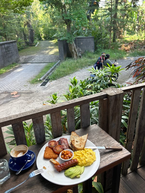 Breakfast on a Kediri balcony, with local life passing by