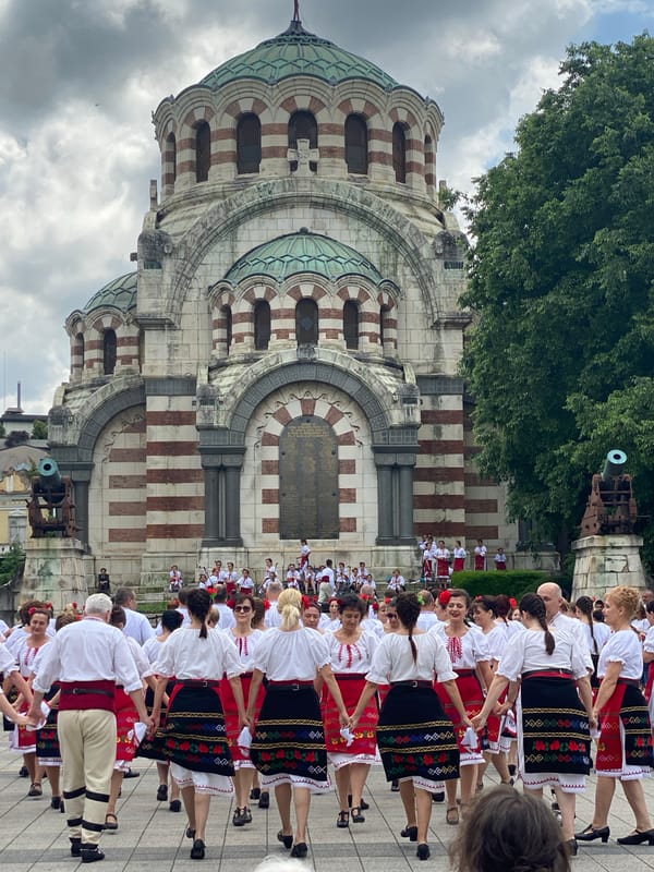 Bulgarian folk dancers perform traditional dances in Pleven plaza