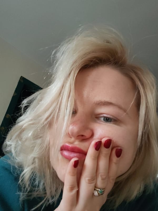 Woman documents morning selfies and pet care in Izhevsk