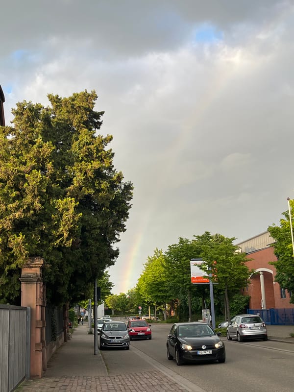 Rainbow appears over Landau in der Pfalz during evening
