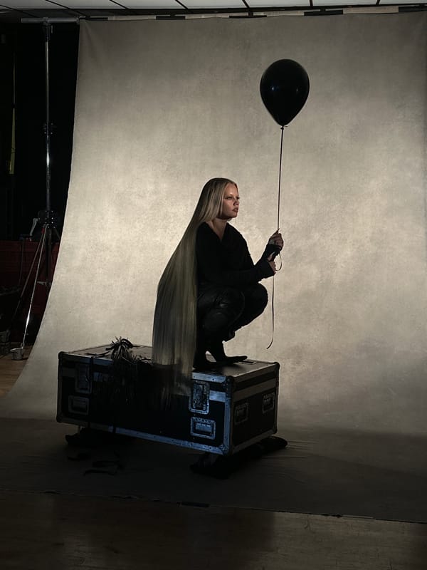 Photography studio session captures woman with balloon in London