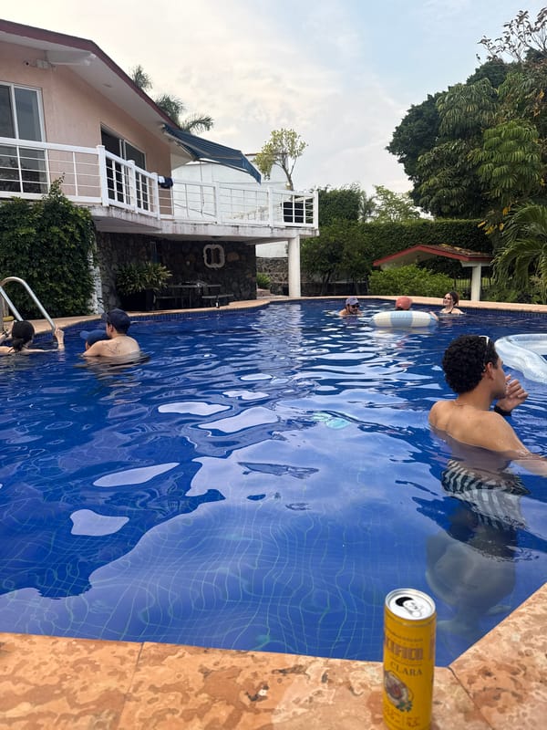 Evening pool gathering with swimmers in Oaxtepec, Mexico