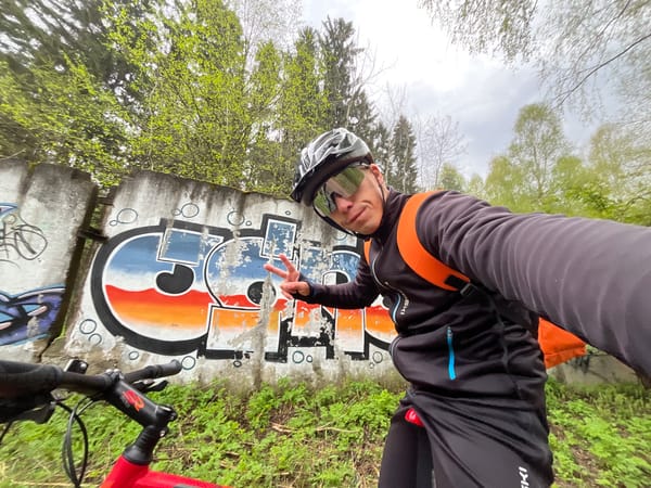 Cyclist takes selfies during early morning mountain bike ride