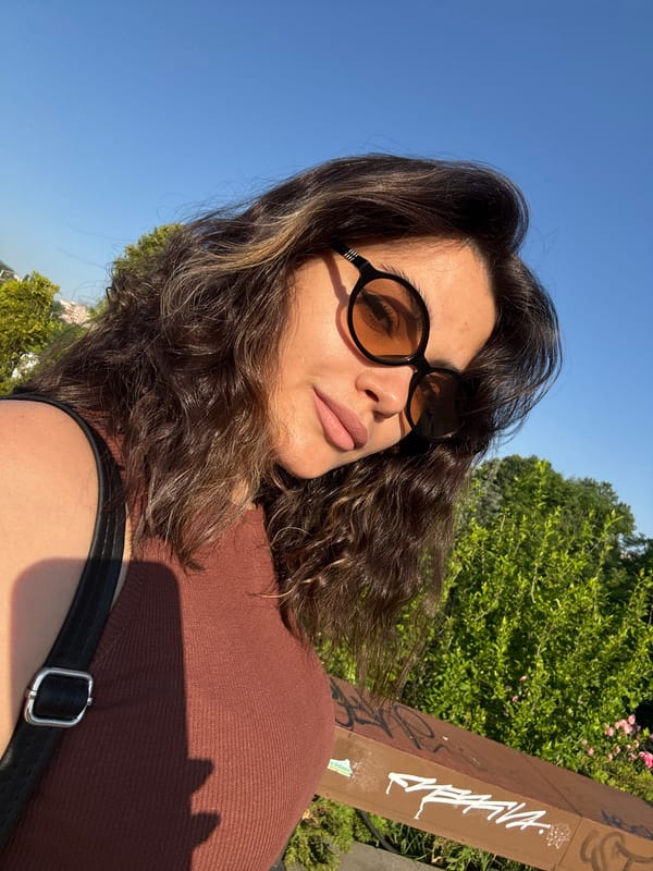 Woman Takes Early Morning Selfies Outdoors in Brown Tank Top