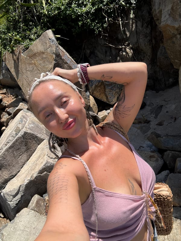 Selfie at Nha Trang's rocky coastline on a cloudy morning