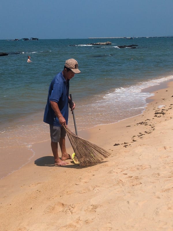 Early morning beach maintenance observed in Phú Quốc, Vietnam