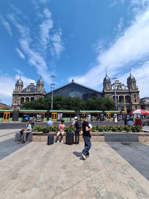 Street life around Budapest's Keleti Station on a summer morning