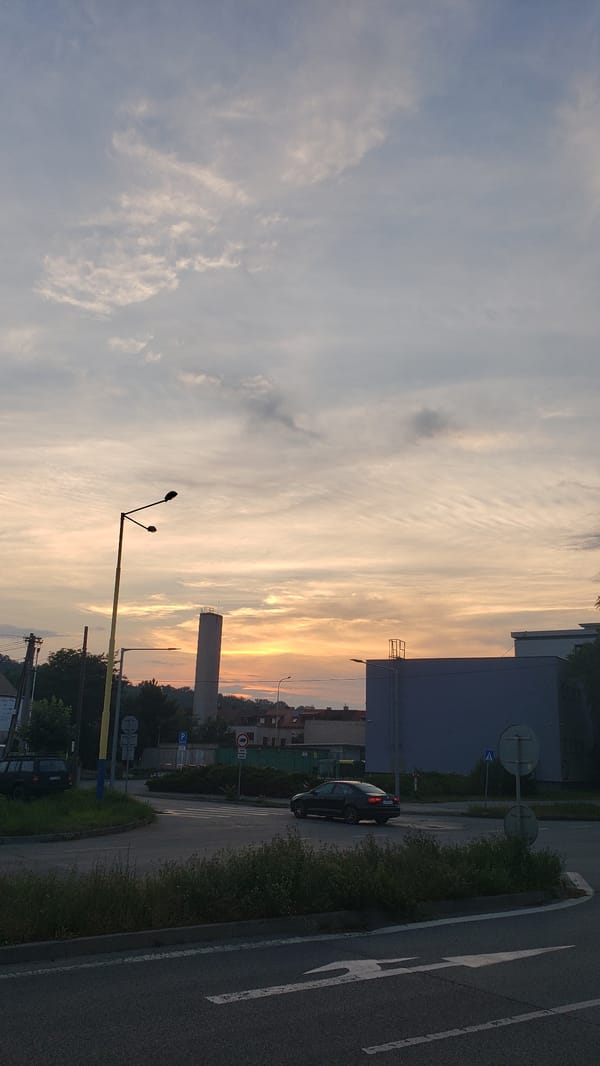 Summer sunset across Prešov, streets and skyline glowing