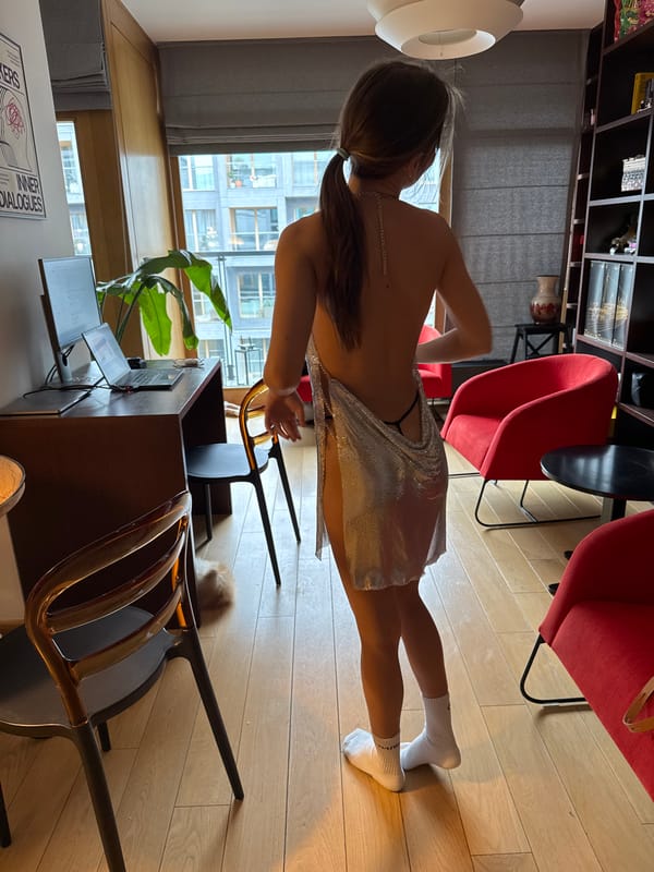 Woman photographed in modern Warsaw apartment during daytime session