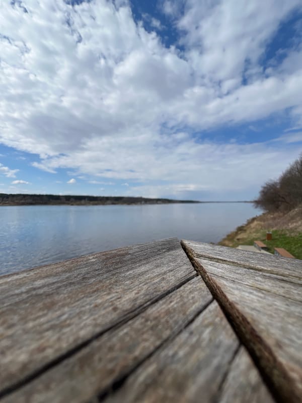 Woman takes selfie at Riga waterfront during morning outing