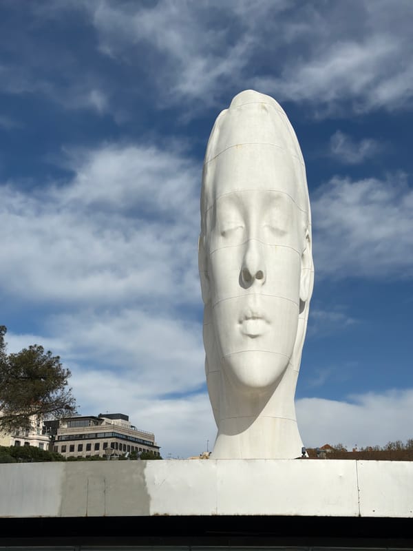 Monumental white head sculpture observed in Madrid