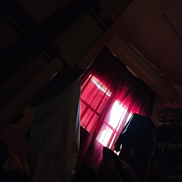 Interior room with red curtains documented in Fez