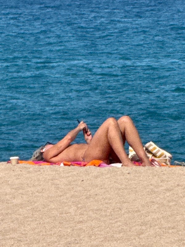 Afternoon beach town scenes in Blanes, Spain