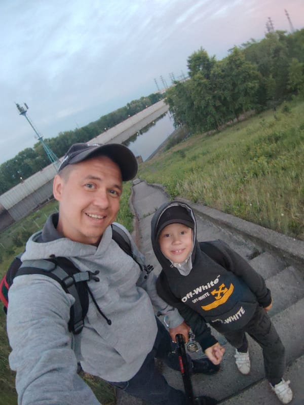 Father and son enjoy twilight fishing trip in Chaikovsky
