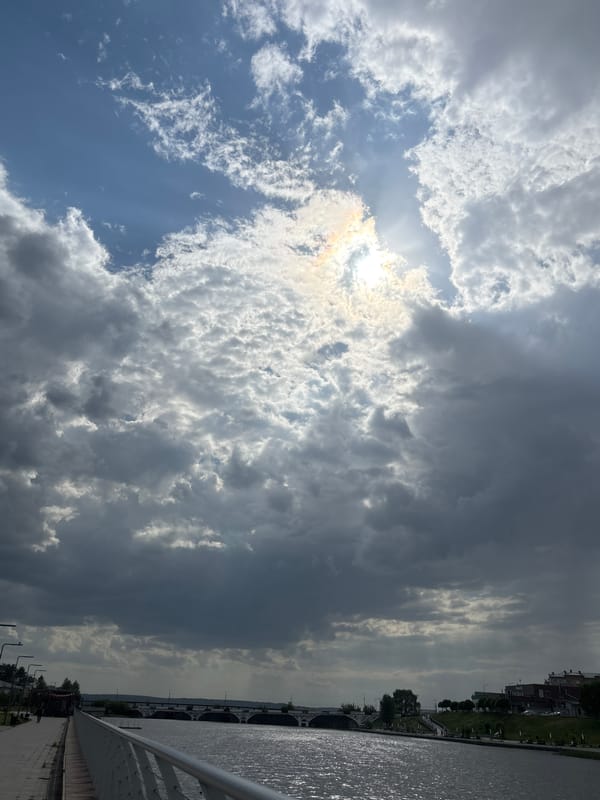 Cloudy spring afternoon documented along Votkinsk riverside promenade