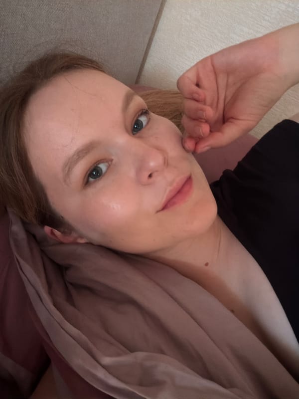 Casual close-up portrait, resting on a pillow