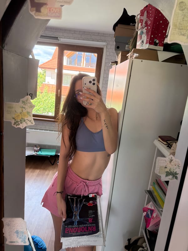 Student takes mirror selfie with biology textbook in Kyustendil