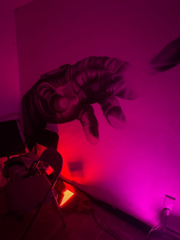Late-night DJ setup spotted in pink-lit Puebla venue