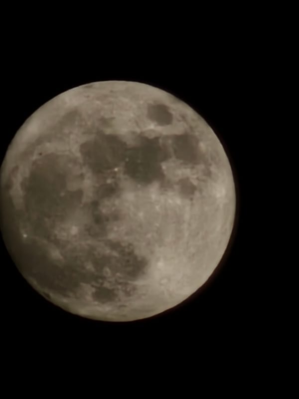 Moon's surface details photographed from Holywell, UK