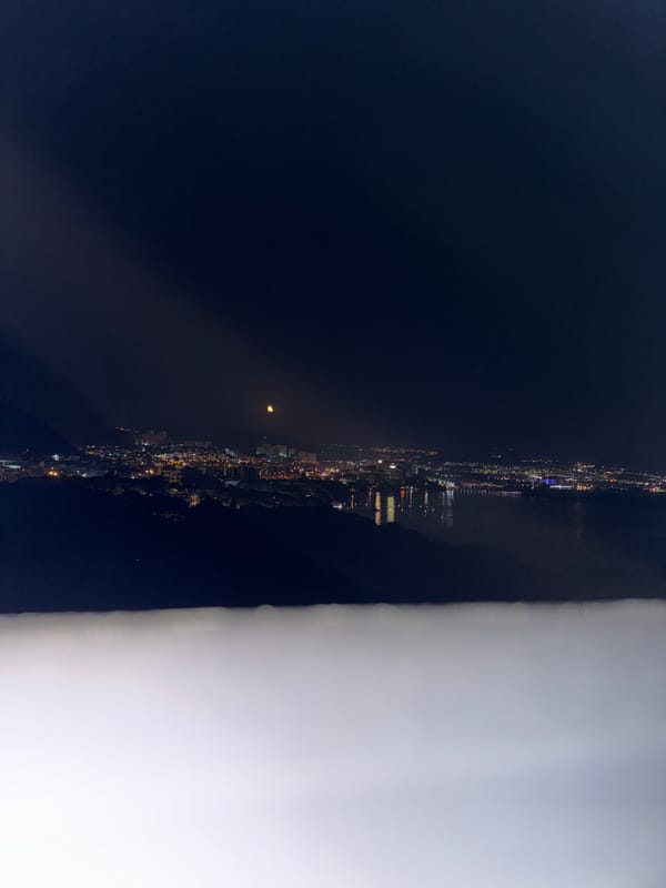 Nighttime panoramic views captured of Kuşadası, Turkey coastal cityscape