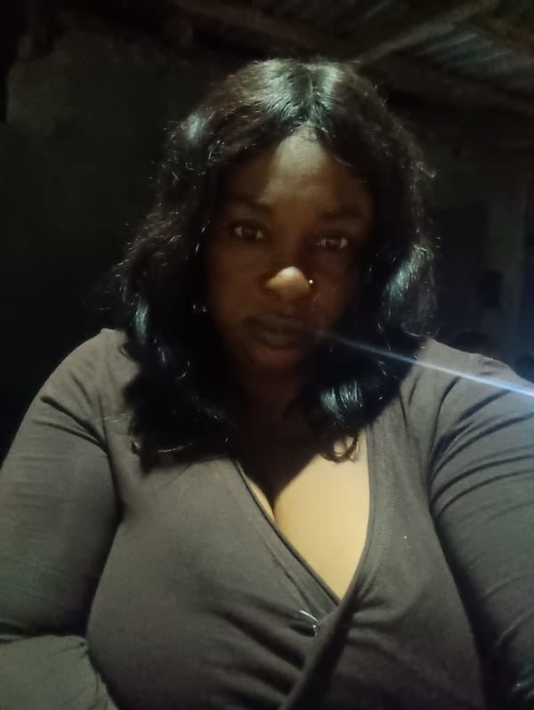 Woman with nose piercing observed indoors in Jos, Nigeria